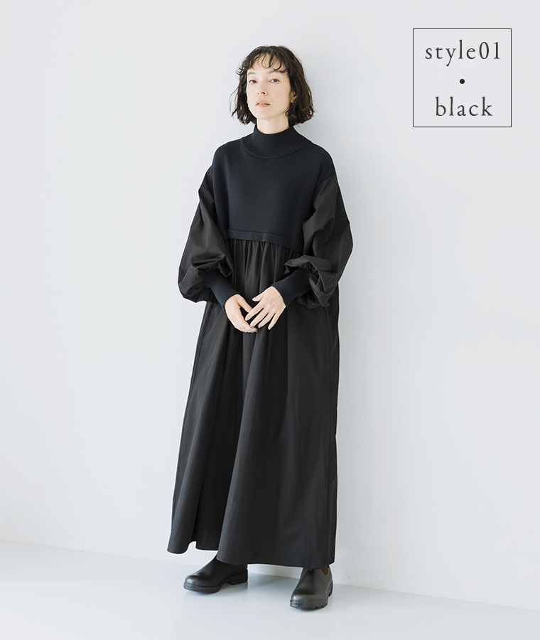 ニット×フハク ハイネックワンピース ブラックを着用し正面を向いて立つ全身スタイル
