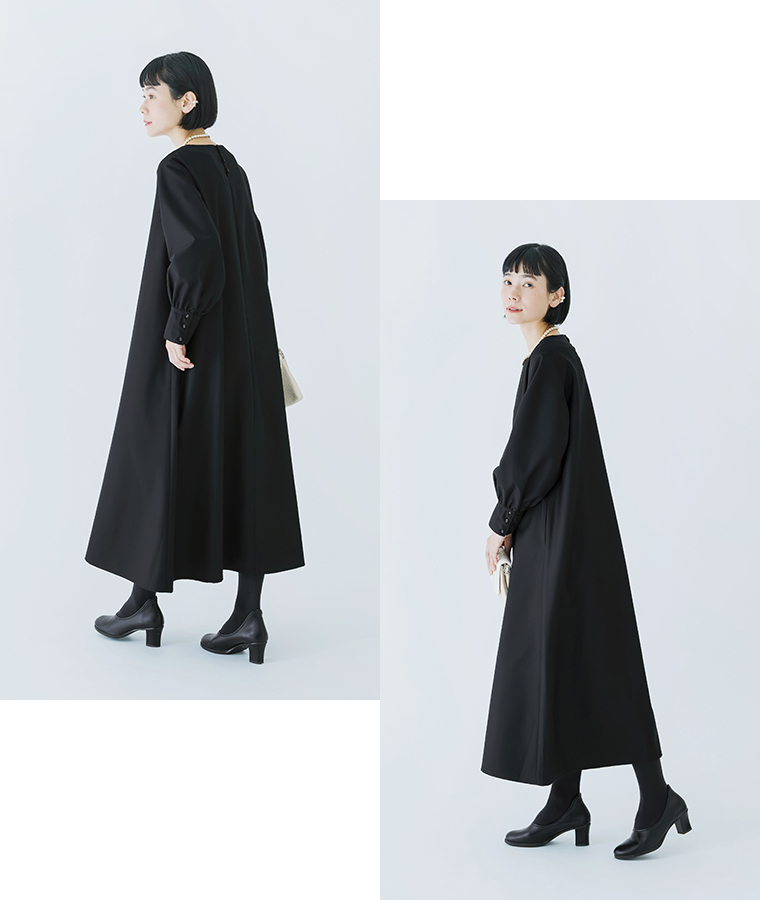 D*g*yのオケージョンワンピース後ろ姿。ブラックカラーで落ち感のあるロングシルエット