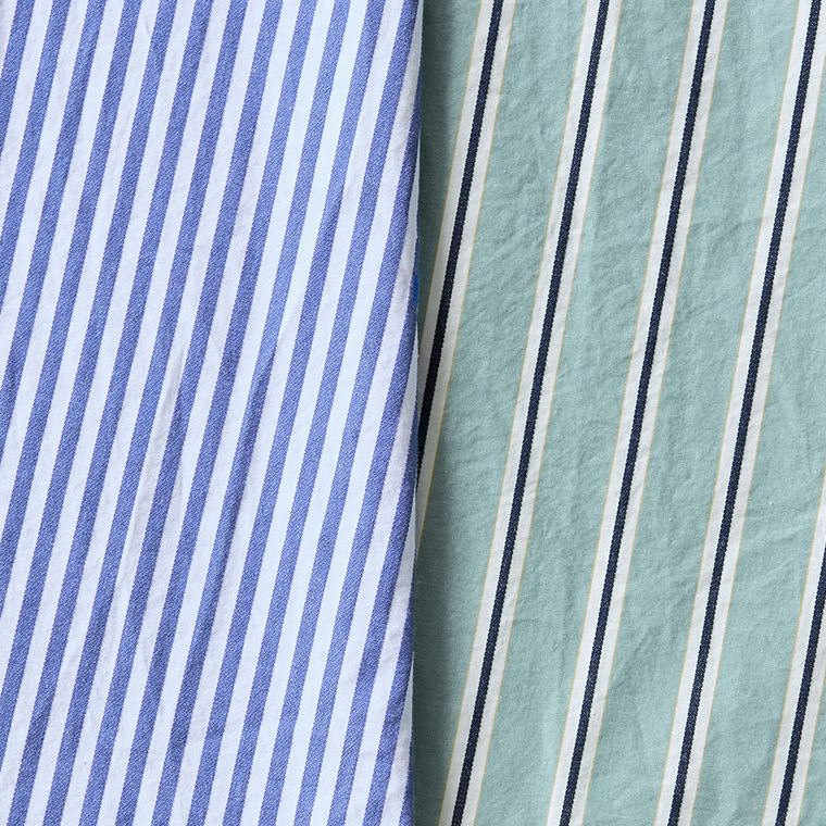 ストライプ柄の異なる2種類の生地を並べた比較画像（ブルー×ホワイトとグリーン×ホワイト×ブラック）
